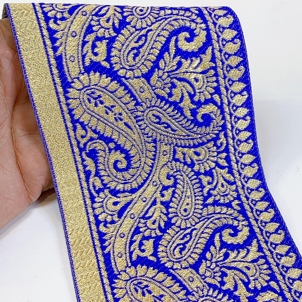 100mm Designer Foral Golden Banarasi Lace, shown on white cotton