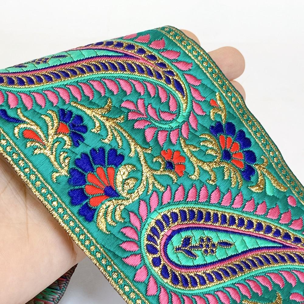 100mm Designer Colorful Jacquard Lace, shown on white cotton
