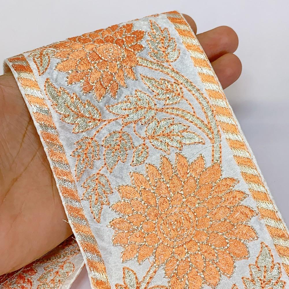95mm Designer Silver Embroidery Lace, shown on white cotton