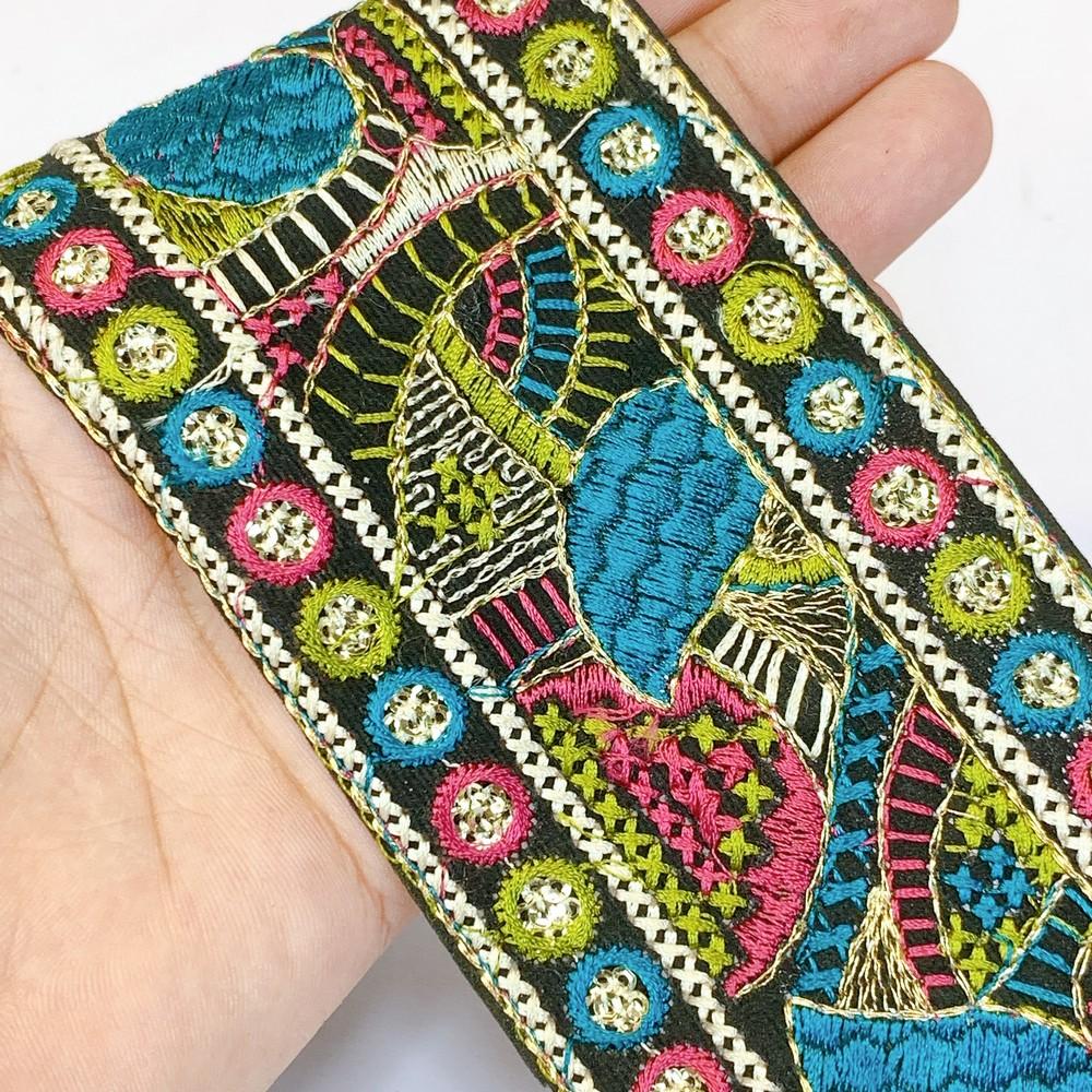 72 mm Cross Stich Khichadi Multicolour Embroidery Lace, shown on white cotton