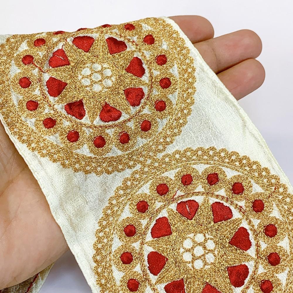 100mm Designer Zari Embroidery Lace, shown on white cotton