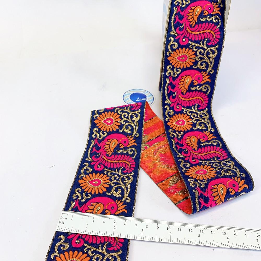 65mm Designer Jaquard lace, shown on white cotton
