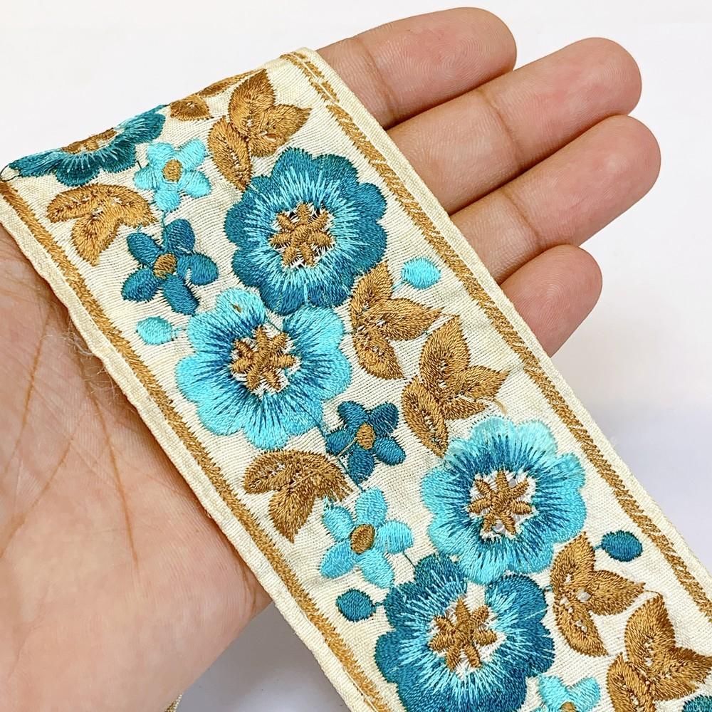 62 mm Designer Parsi Embroidery Lace, shown on white cotton
