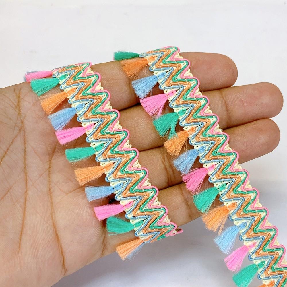 26 mm Designer Metallic Fringe, shown on white cotton