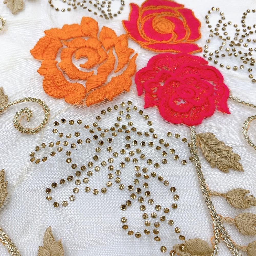 Embroidery Work On Net Fabric, shown on white cotton