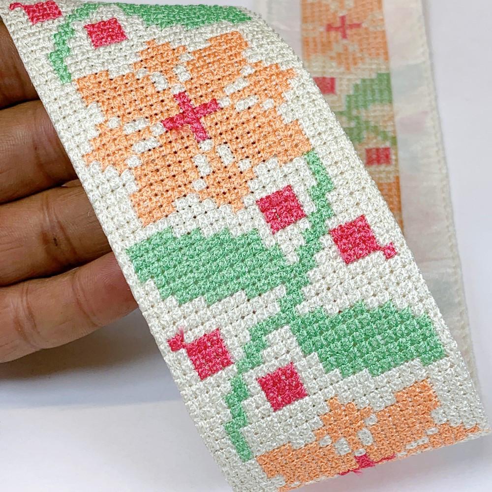 Lami 56 mm Designer Crossstitch Embroidery Lace, shown on white cotton