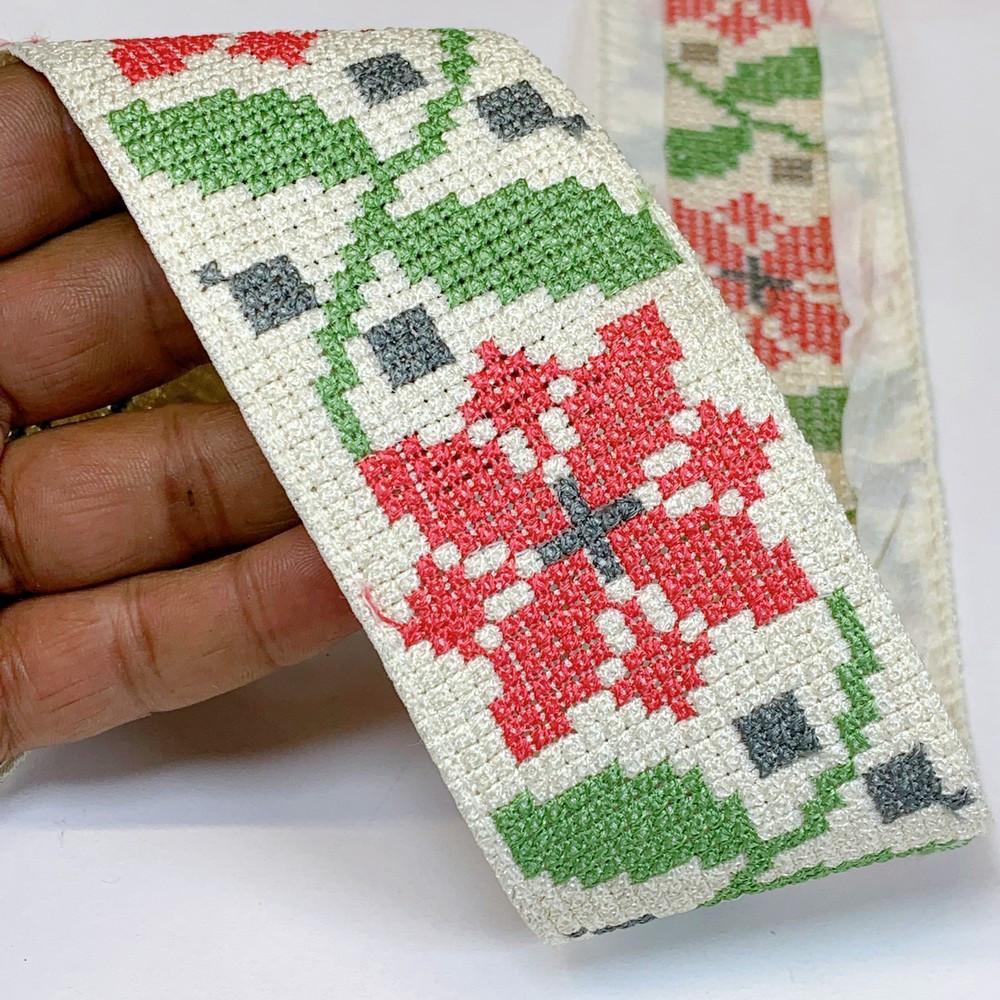 Lami 56 mm Designer Crossstitch Embroidery Lace, shown on white cotton