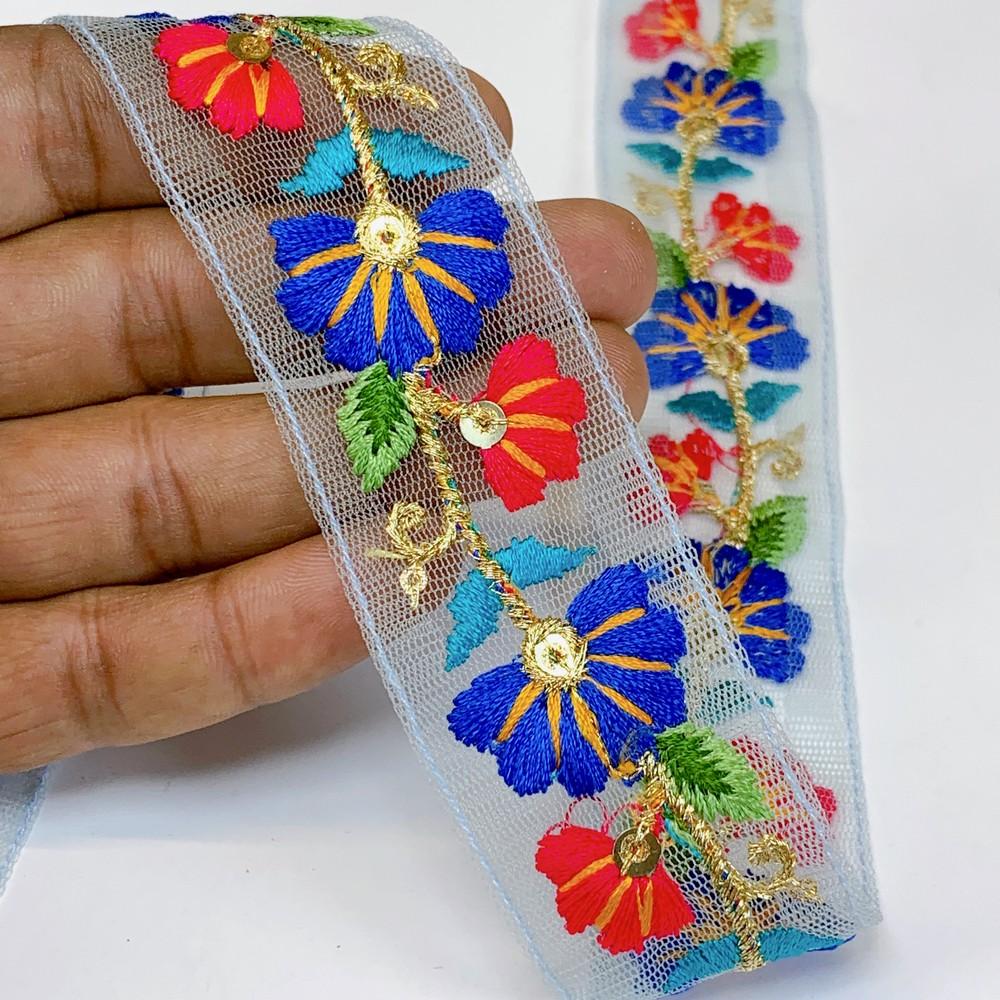Lami 32 mm Designer Colorful Parsi Embroidery Lace, shown on white cotton