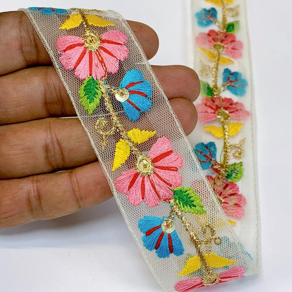 Lami 32 mm Designer Colorful Parsi Embroidery Lace, shown on white cotton