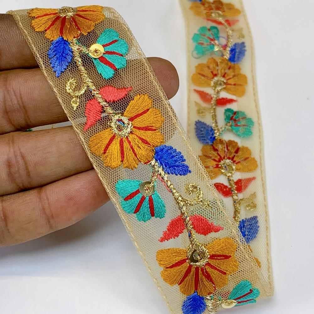 Lami 32 mm Designer Colorful Parsi Embroidery Lace, shown on white cotton