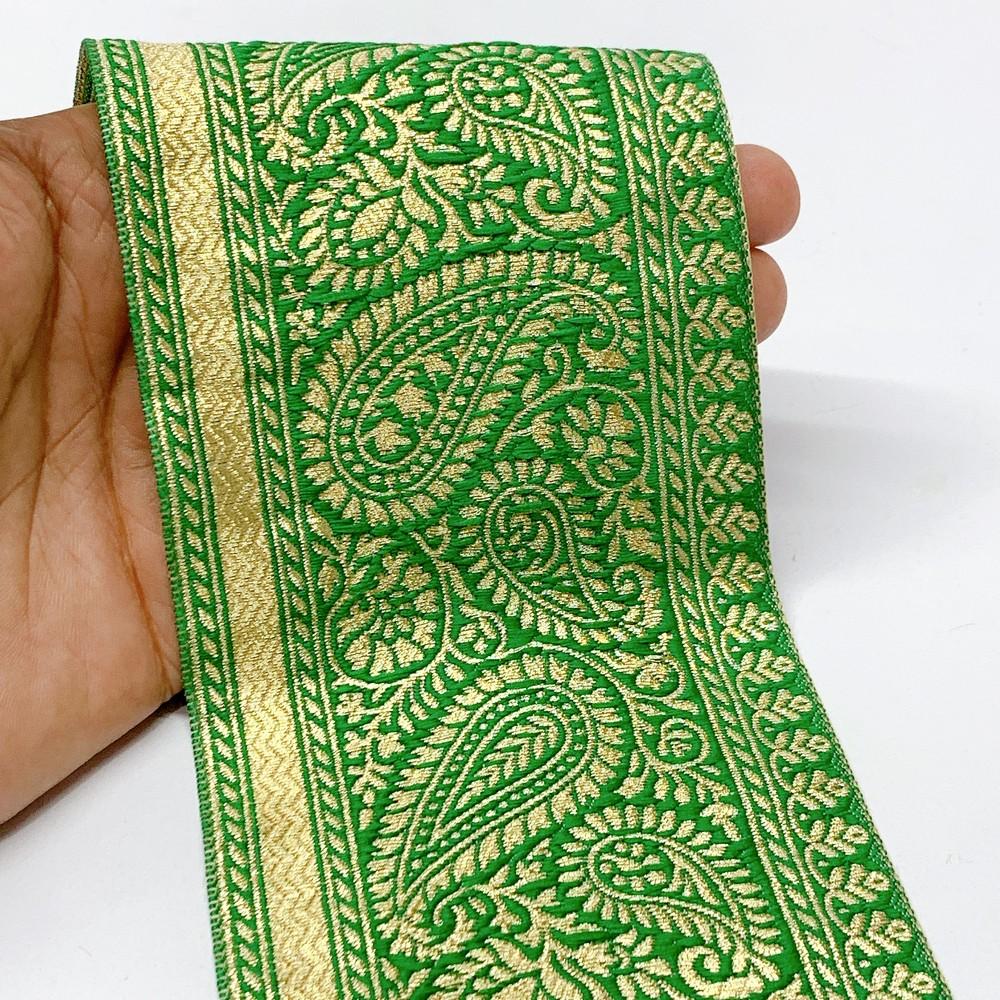 90mm Designer Foral Golden Zari Banarsi Lace, shown on white cotton