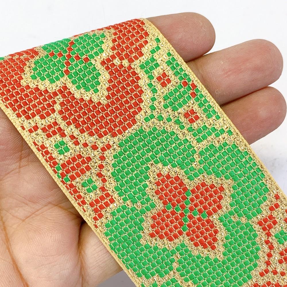 55mm Designer Cross stitch Jacquard Ribbon, shown on white cotton