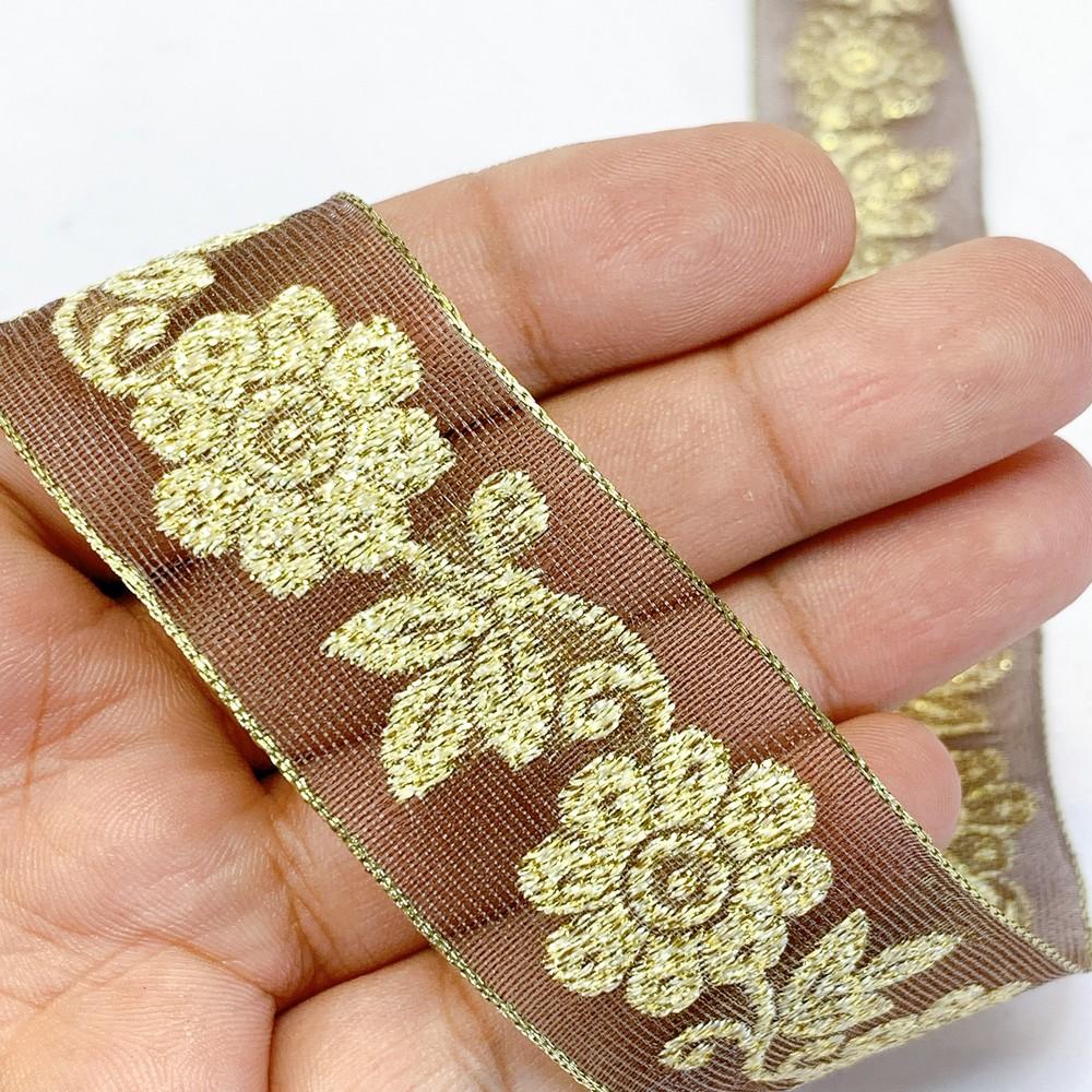 25mm Designer Jacquard Ribbon With Zari Threads, shown on white cotton