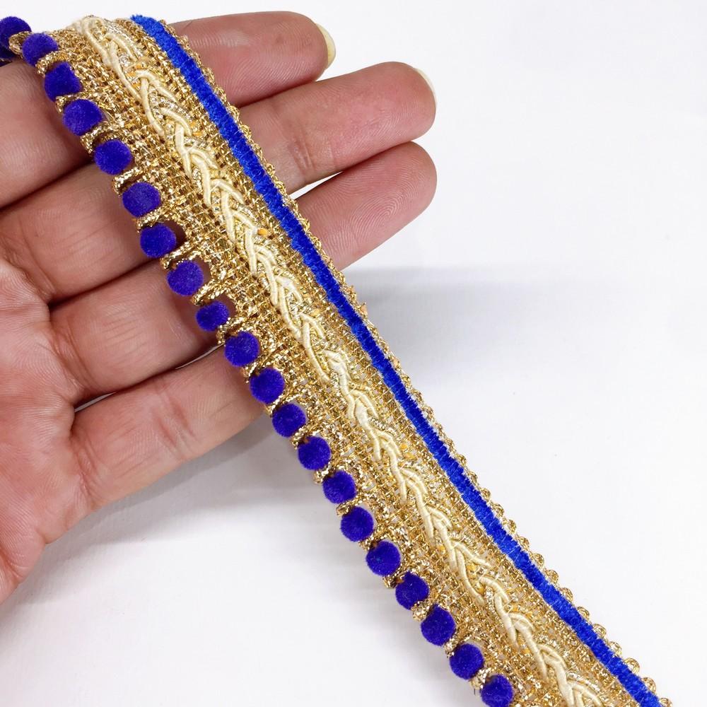 25mm Traditional Multicolor Beaded Pom Pom Crochet Trim, shown on white cotton