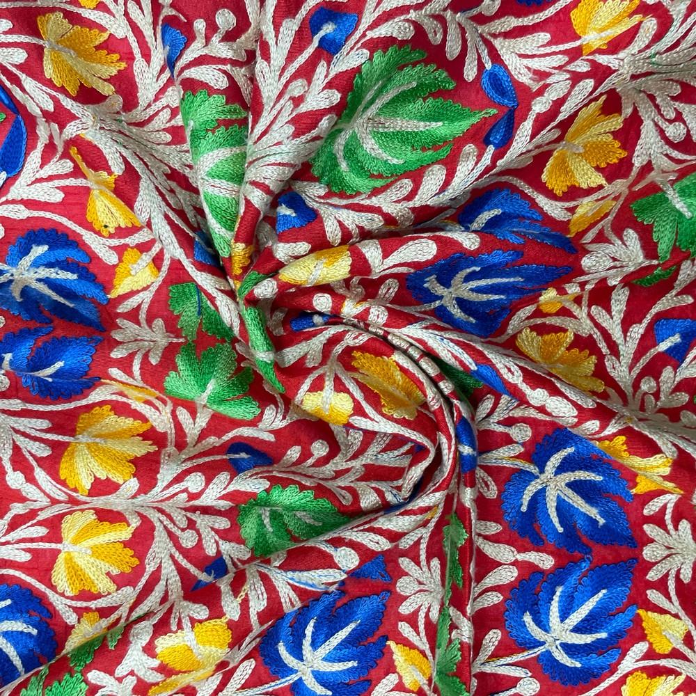 Vibrant Multicolor Kashmiri Aari Embroidery on Red Dupion Fabric 38" Width, shown on white cotton