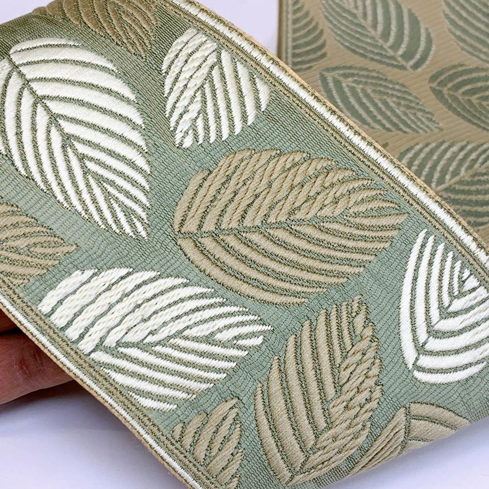 90mm Elegant Leaf Pattern Tapestry Tapes, shown on white cotton