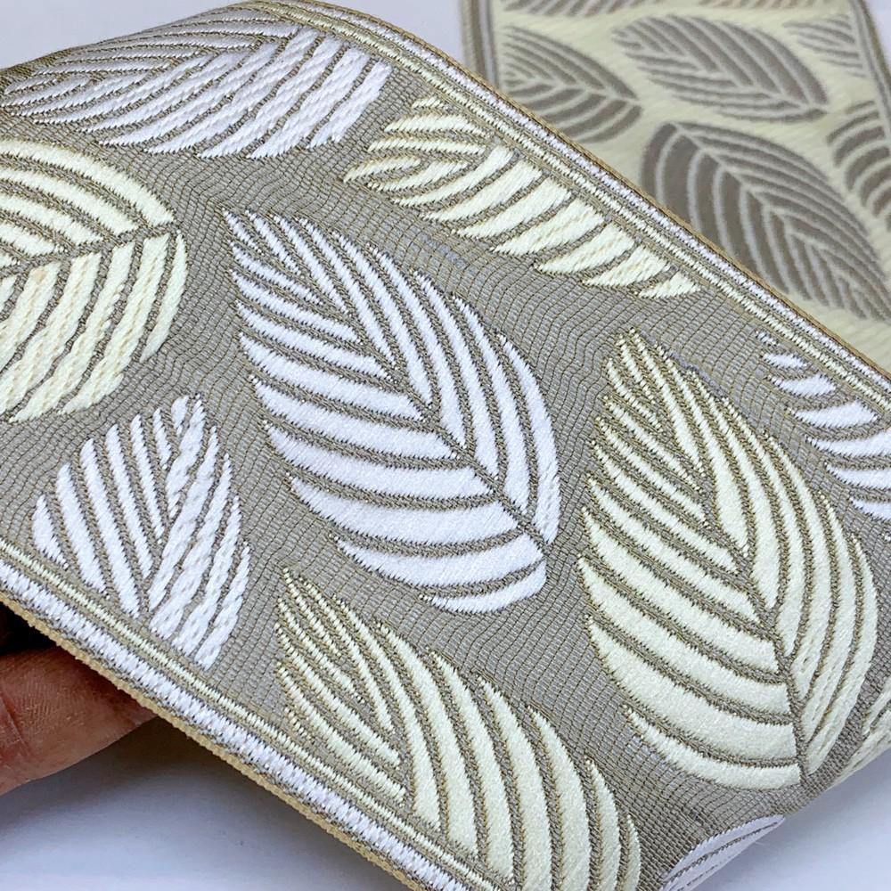 90mm Elegant Leaf Pattern Tapestry Tapes, shown on white cotton