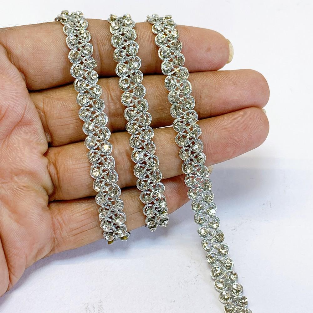 9mm Designer StoneWork Crochet Lace, shown on white cotton