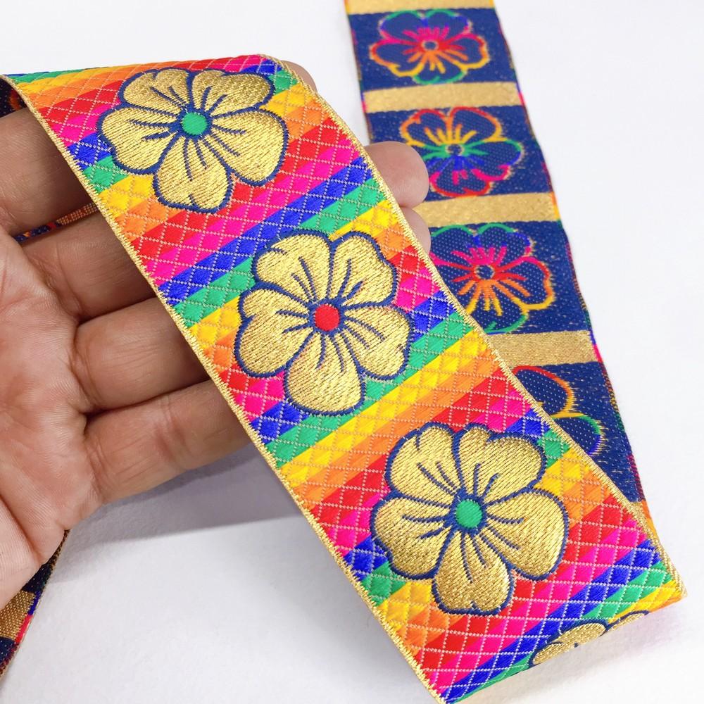 50mm Colorful Floral Jacquard Ribbon, shown on white cotton