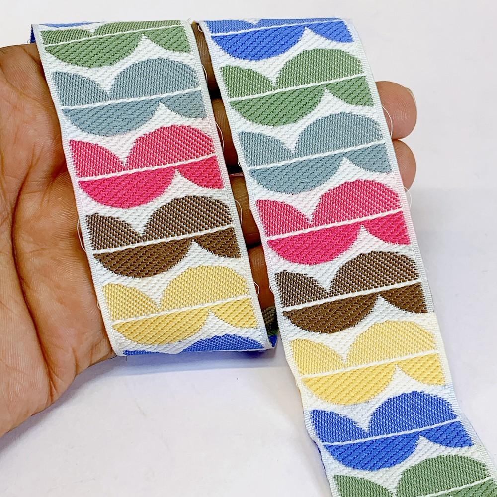 36mm Woven Jacquard Ribbon with Modern Leaf Pattern, shown on white cotton