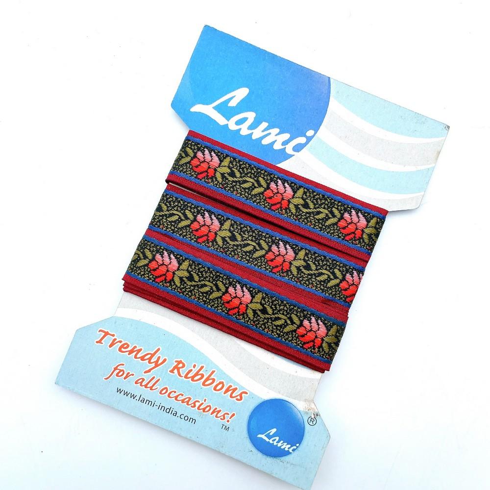 20mm Floral Jacquard Ribbon with Red Rose Pattern, shown on white cotton