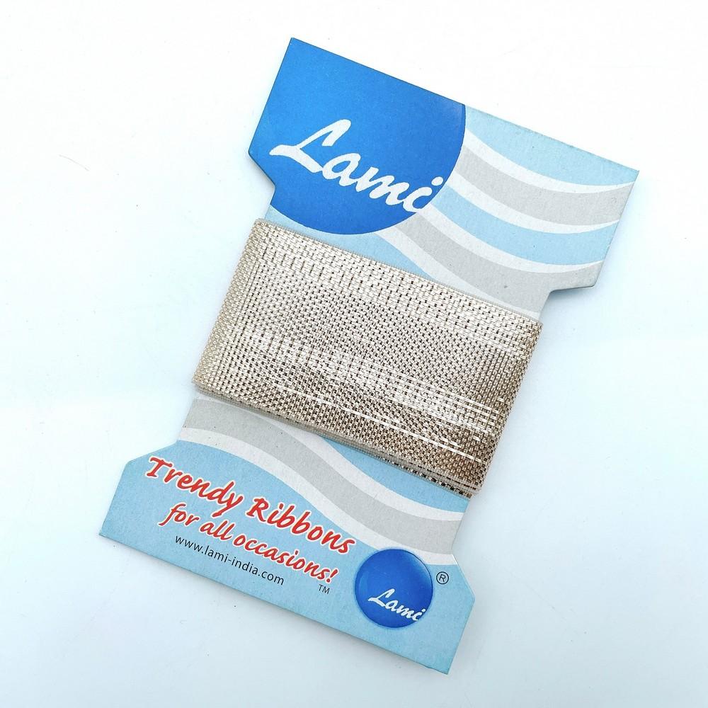 40mm Wide Metallic Beige Net Ribbon, shown on white cotton
