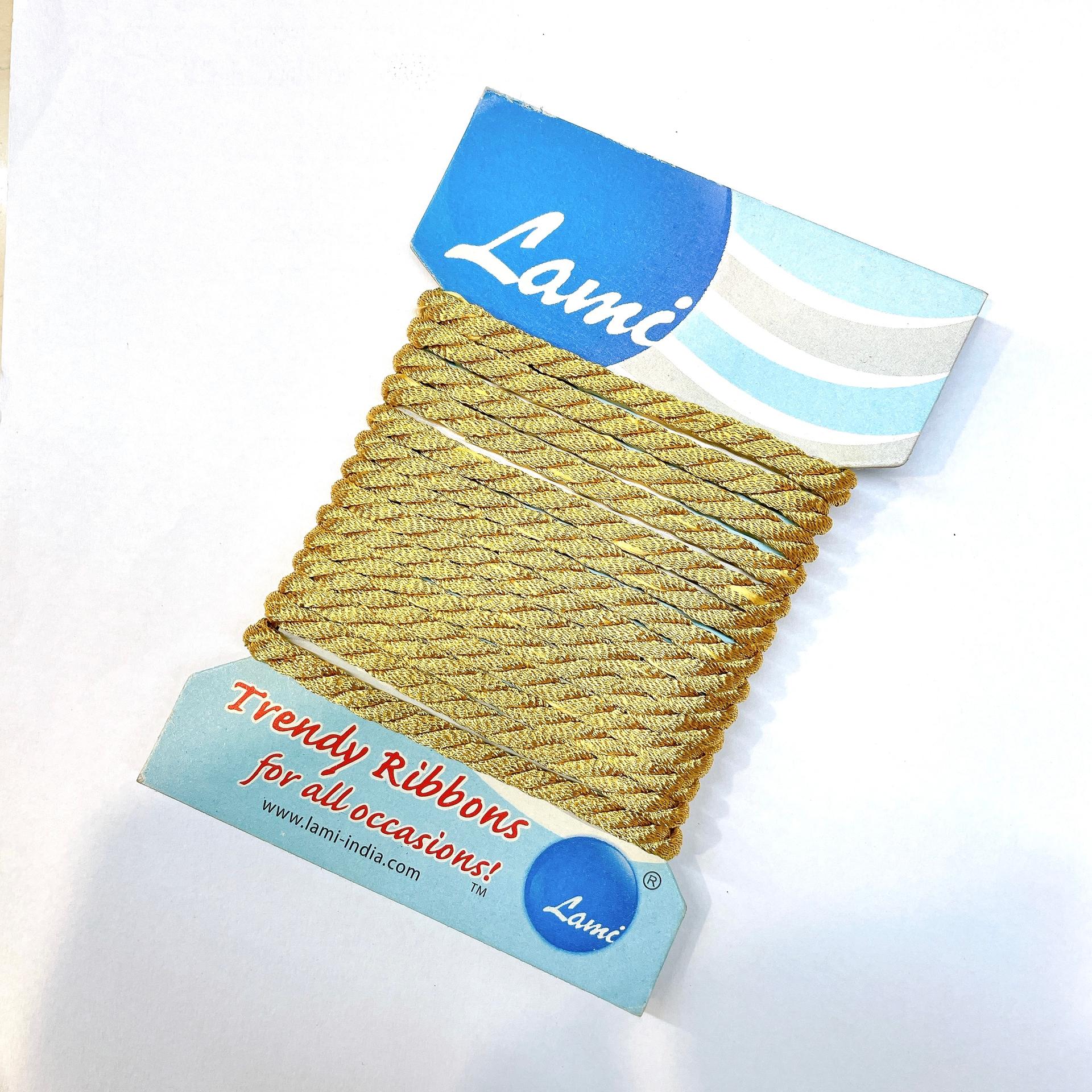 05mm Twisted Cord Ribbon, shown on white cotton