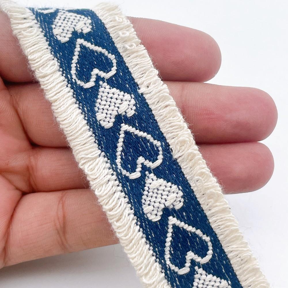 30mm Stylish Denim Fringe Lace with Heart Pattern for Garments & Crafts, shown on white cotton