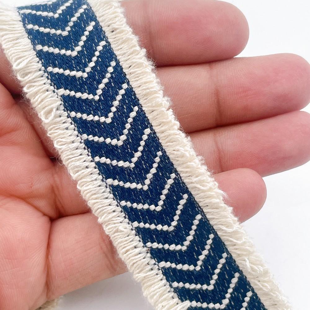 30mm Premium Denim Fringe Lace with Chevron Design for Trendy Outfits, shown on white cotton