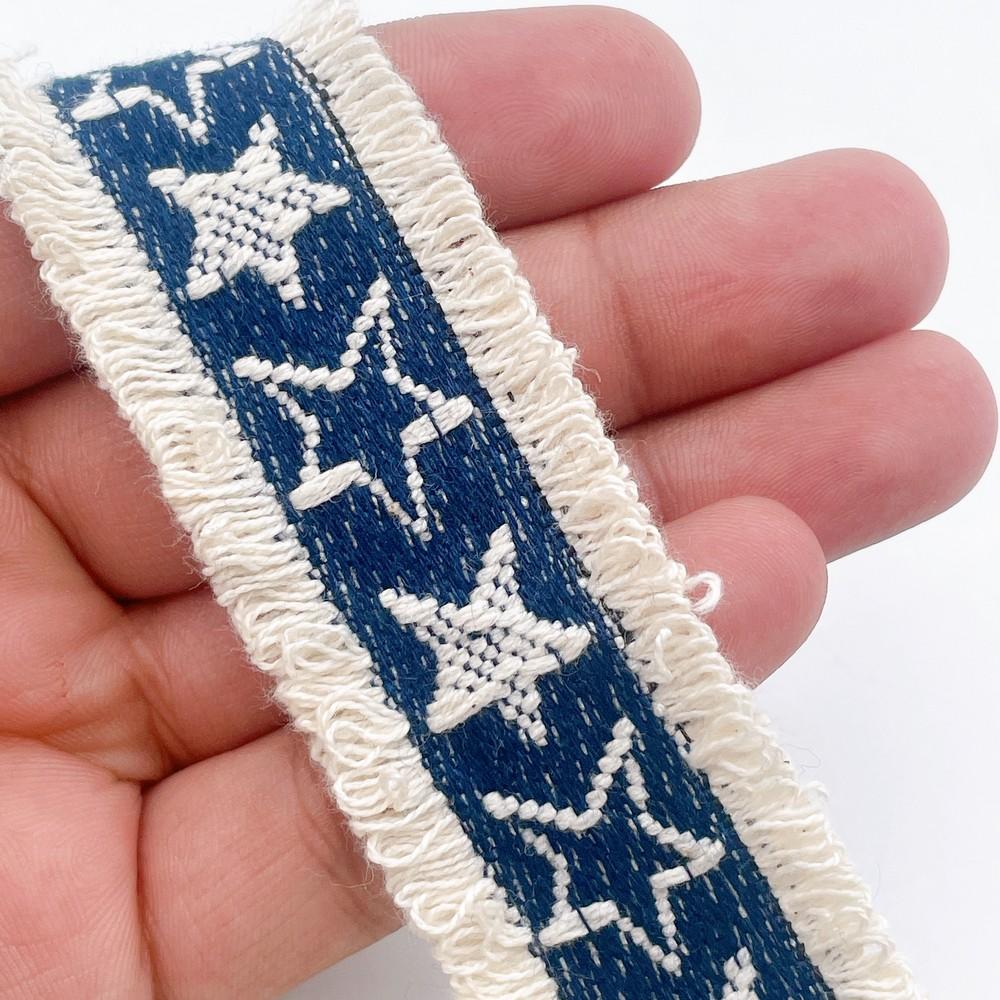 30mm Bohemian Style Denim Fringe Lace with Star Motif for Clothing & Decoration, shown on white cotton