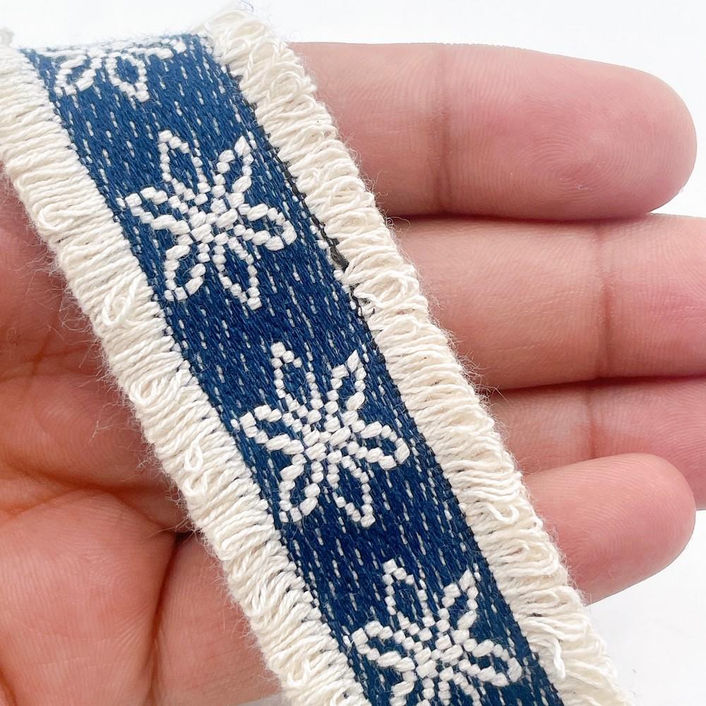 30mm Boho Denim Fringe Lace with Star Pattern for Fashion & DIY Projects, shown on white cotton