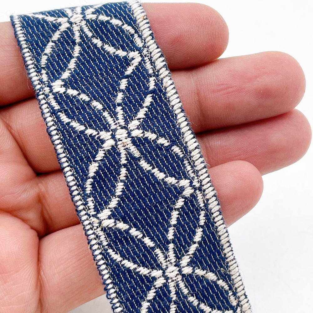 32mm Denim-Blue Jacquard Ribbon - Sashiko Starburst Floral Border Tape, shown on white cotton