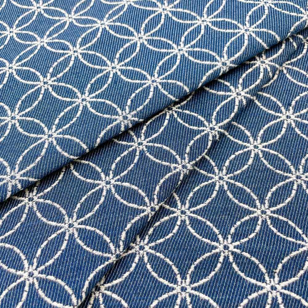 9oz Blue Interlocking Circle Jacquard Denim Fabric, shown on white cotton