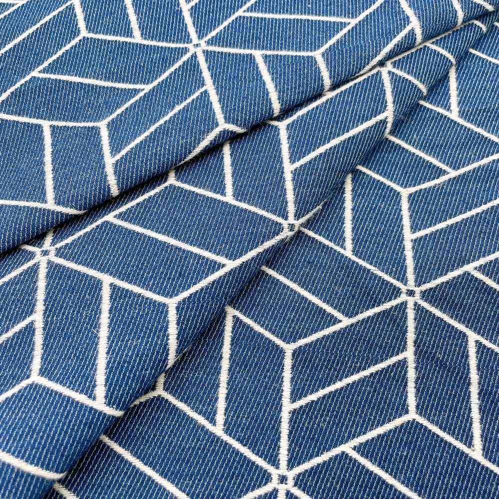 9oz Blue 3D Isometric Cube Pattern Jacquard Denim Fabric, shown on white cotton