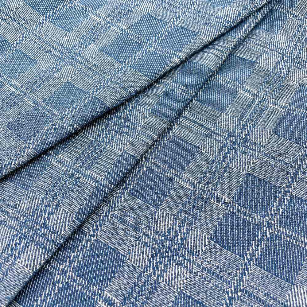 9oz Blue Geometric Diamond Pattern Jacquard Denim Fabric, shown on white cotton
