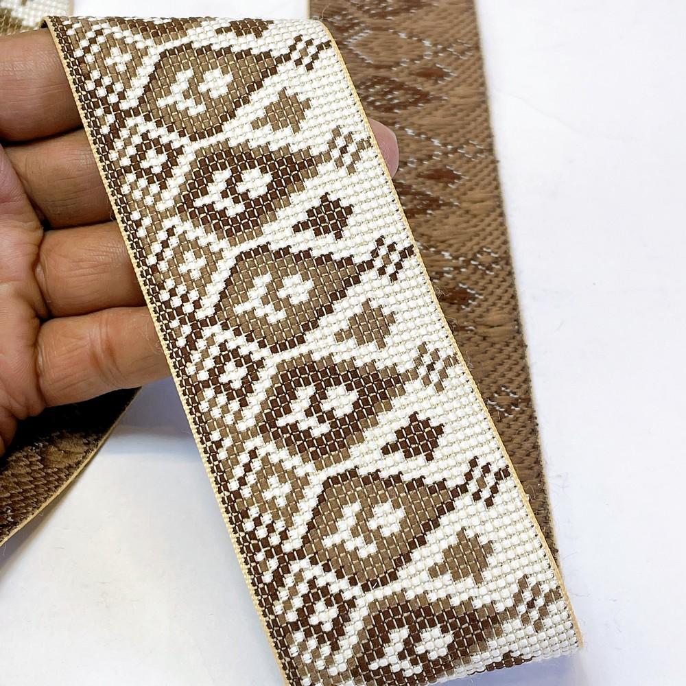 52mm Premium Cross-Stitch Jacquard Ribbon - Ethnic Geometric Border Lace for Garments & Crafts, shown on white cotton