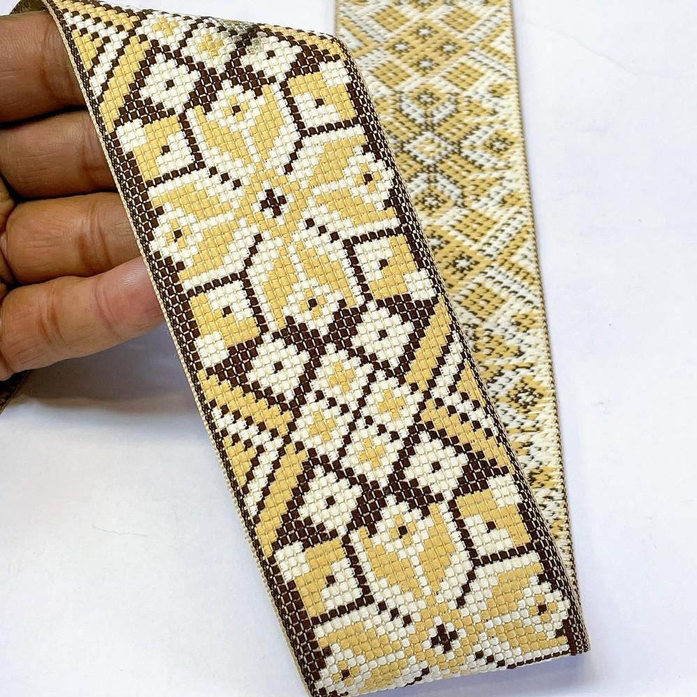 52mm Premium Cross-Stitch Jacquard Ribbon - Ethnic Geometric Border Lace for Garments & Crafts, shown on white cotton