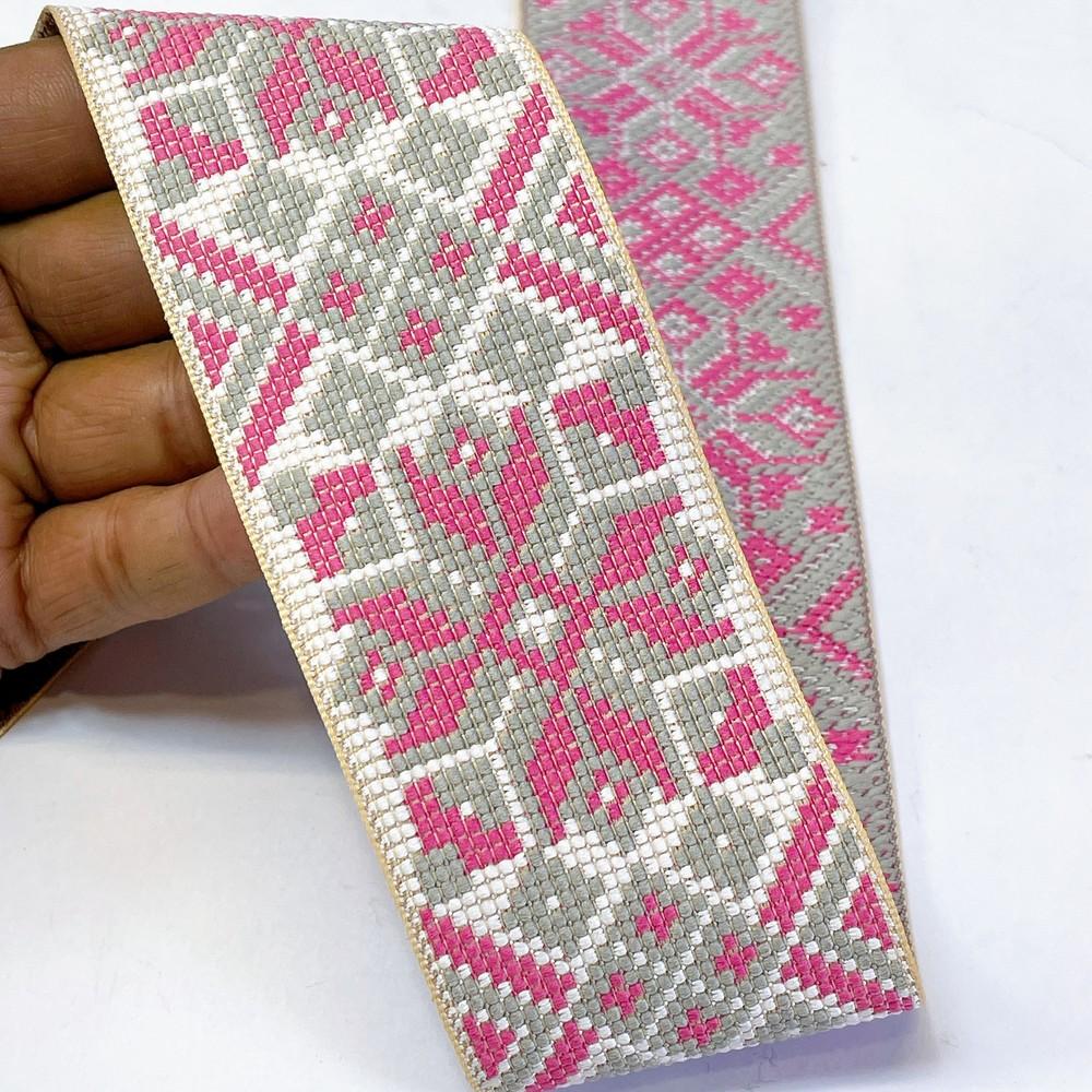 52mm Premium Cross-Stitch Jacquard Ribbon - Ethnic Geometric Border Lace for Garments & Crafts, shown on white cotton