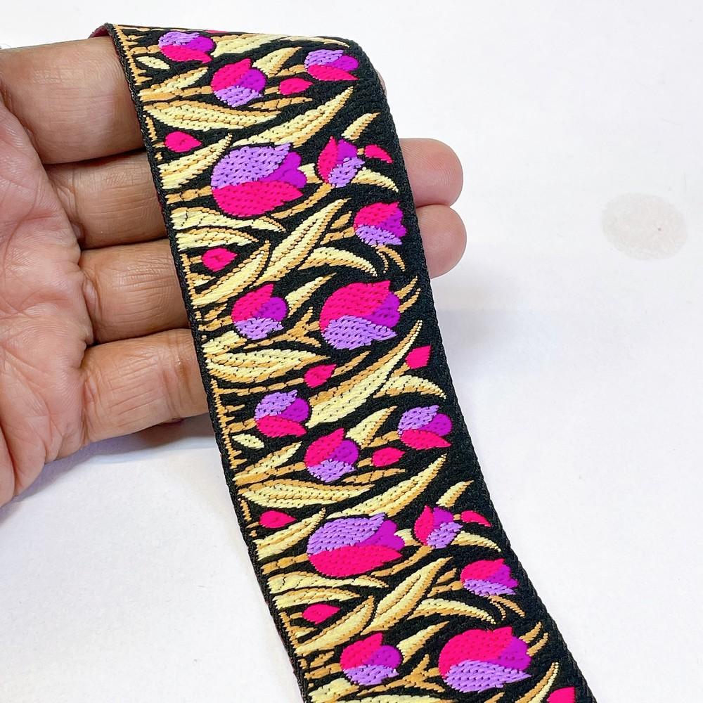 48mm Woven Jacquard Tulip Ribbon | Floral Garden Ethnic Trim | 1.9-Inch Multi-Color Jacquard Border for Boutique Fashion, shown on white cotton