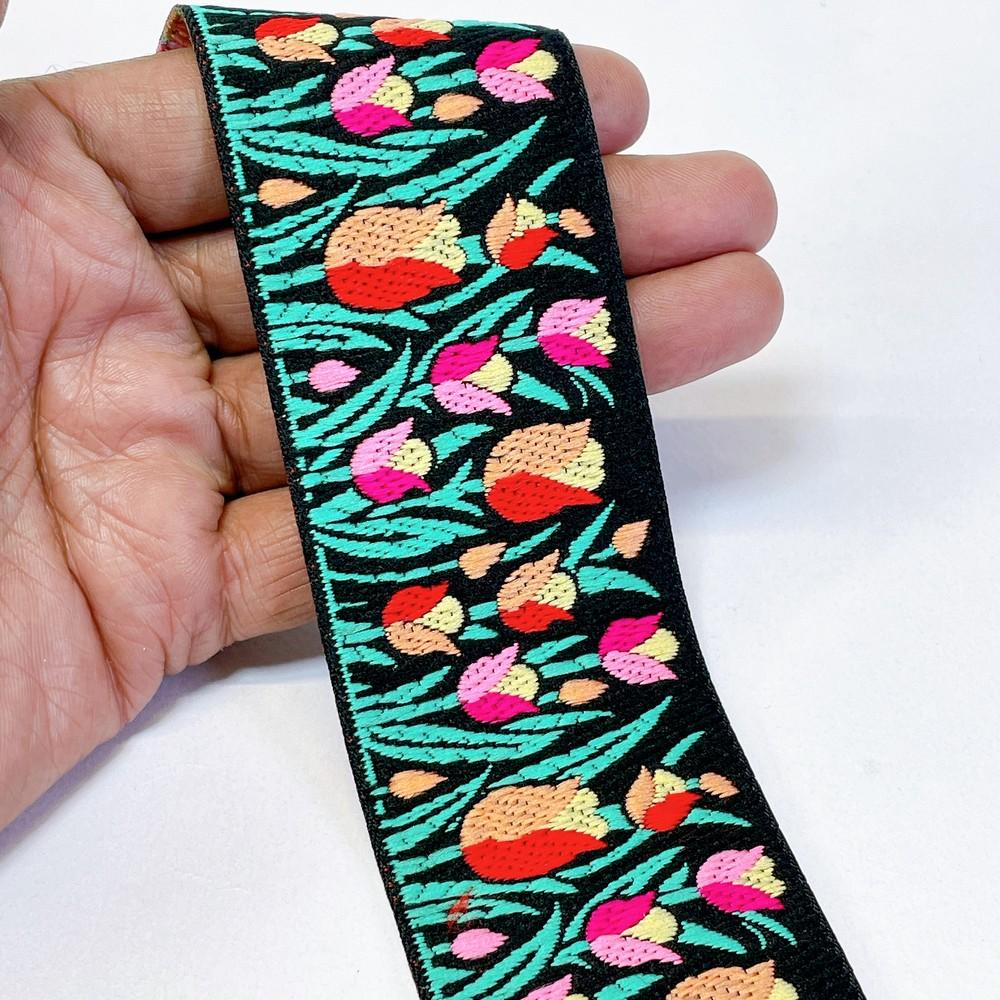 48mm Woven Jacquard Tulip Ribbon | Floral Garden Ethnic Trim | 1.9-Inch Multi-Color Jacquard Border for Boutique Fashion, shown on white cotton