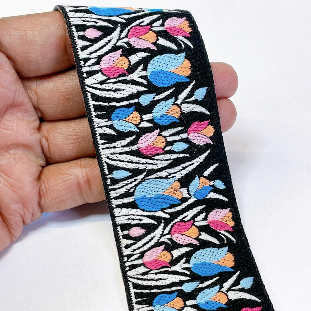 48mm Woven Jacquard Tulip Ribbon | Floral Garden Ethnic Trim | 1.9-Inch Multi-Color Jacquard Border for Boutique Fashion, shown on white cotton