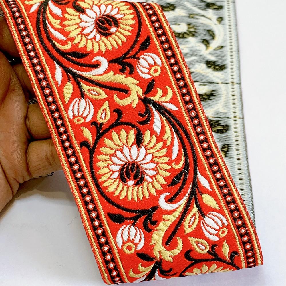 74mm Woven Jacquard Lotus & Vine Ribbon | Premium Ethnic Floral Trim | Wide Multi-Color Jacquard Border for Garments, shown on white cotton