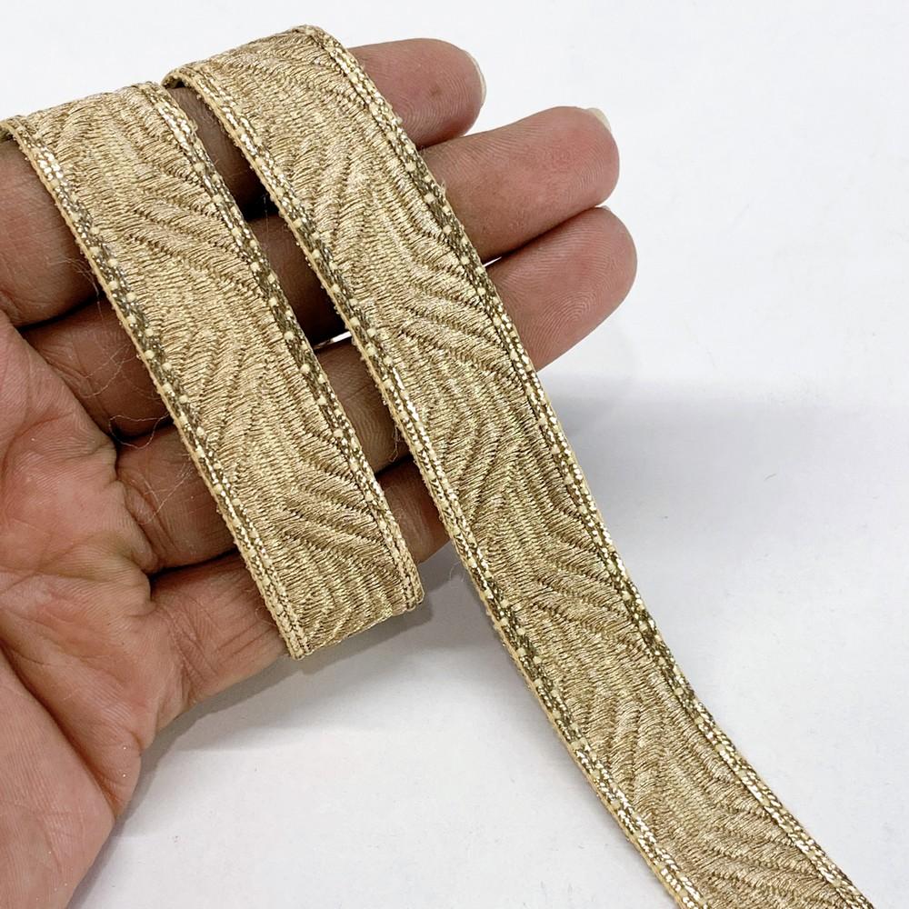 20mm Premium Gold Woven Jacquard Ribbon with Chevron Pattern, shown on white cotton