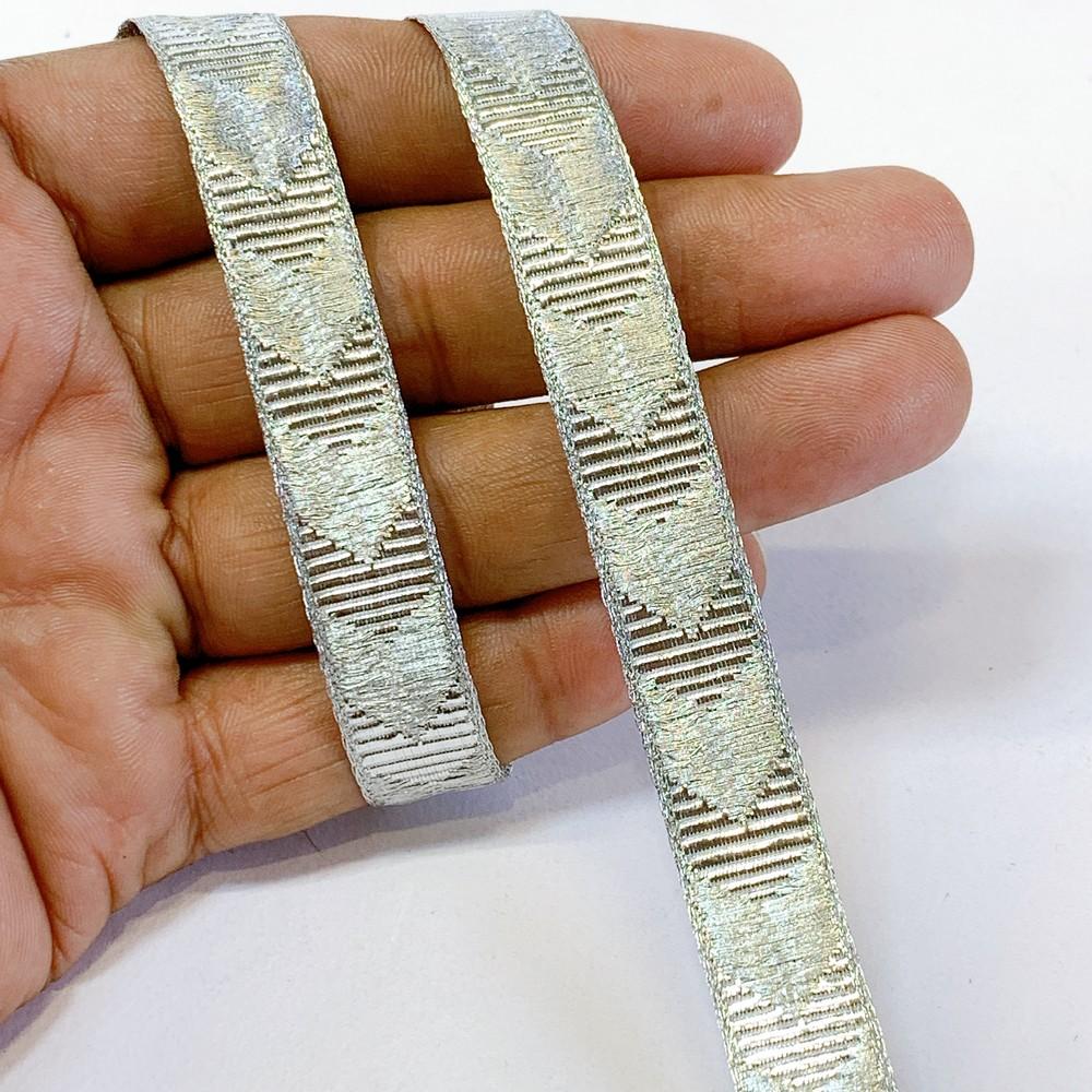14mm Premium Metallic Woven Jacquard Ribbon, shown on white cotton