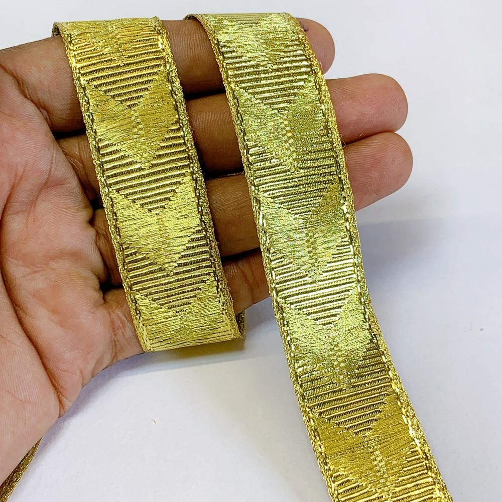 22mm Textured Metallic Zigzag Woven Jacquard Ribbon, shown on white cotton
