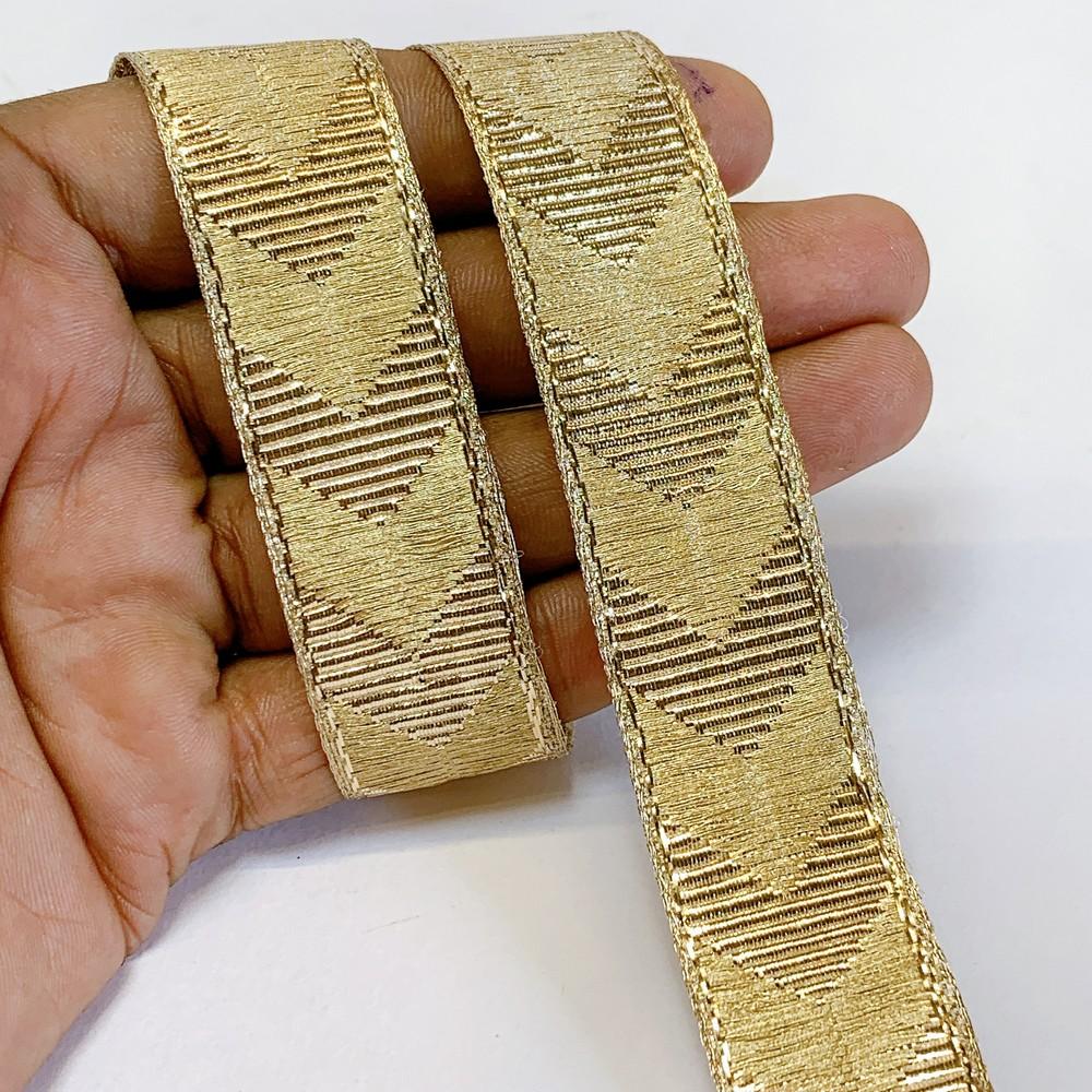 22mm Textured Metallic Zigzag Woven Jacquard Ribbon, shown on white cotton