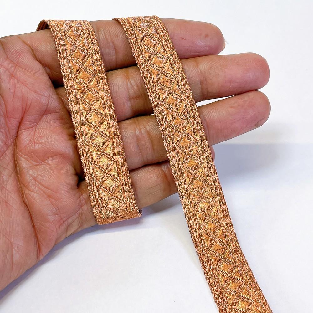15mm Textured Metallic Diamond Motif Woven Jacquard Ribbon, shown on white cotton