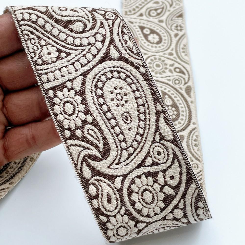 55mm Wide Traditional Paisley Motif Lace Border for Sewing, Garments, DIY Crafts & Home Decor, shown on white cotton