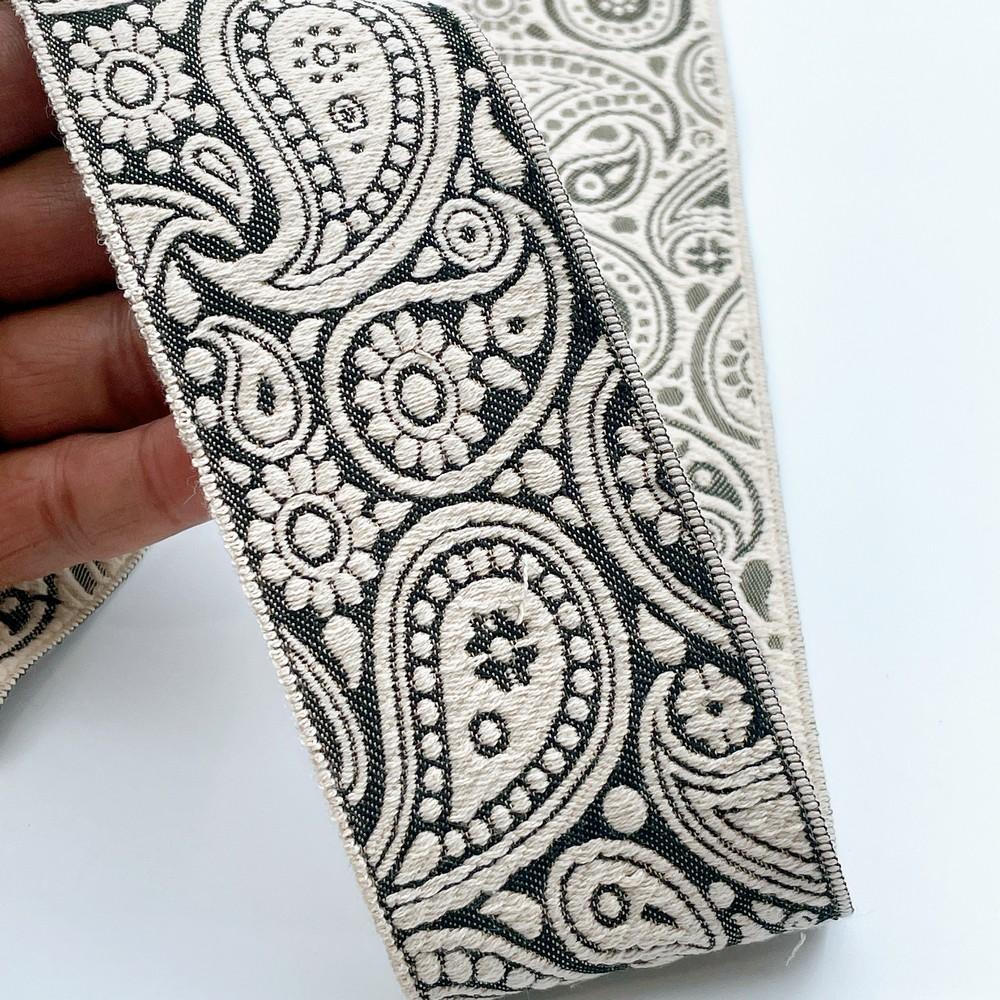 55mm Wide Traditional Paisley Motif Lace Border for Sewing, Garments, DIY Crafts & Home Decor, shown on white cotton
