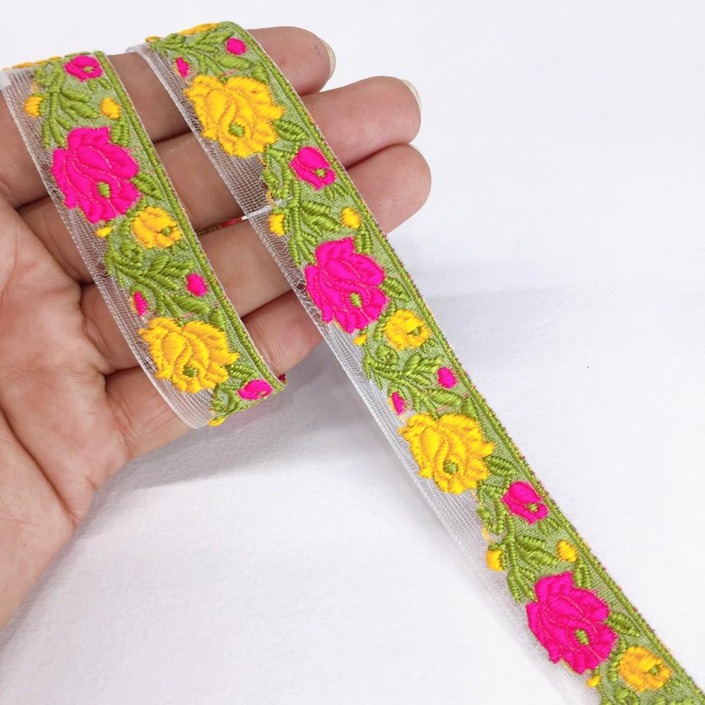 20mm flower creeper vine trim, shown on white cotton